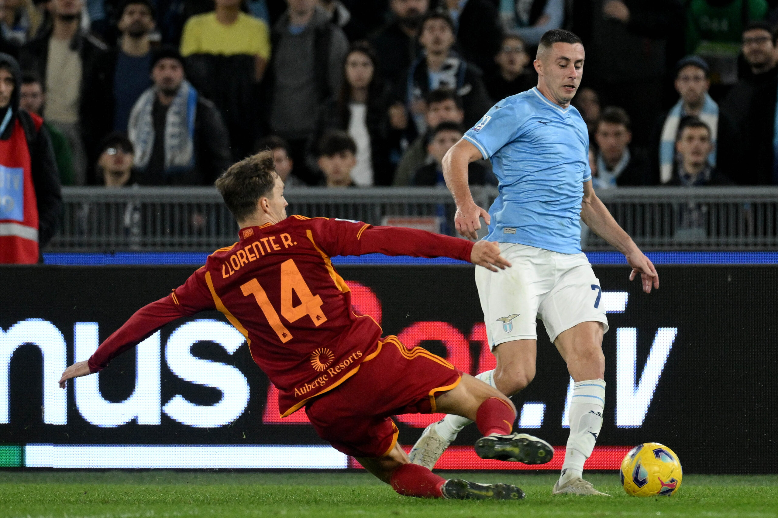 ROME, ITALY - NOVEMBER 12: Adam Marusic of SS Lazio compete for the ball with Diego LLorente of AS Roma during the Serie A TIM match between SS Lazio and AS Roma at Stadio Olimpico on November 12, 2023 in Rome, Italy. (Photo by Marco Rosi - SS Lazio/Getty Images)